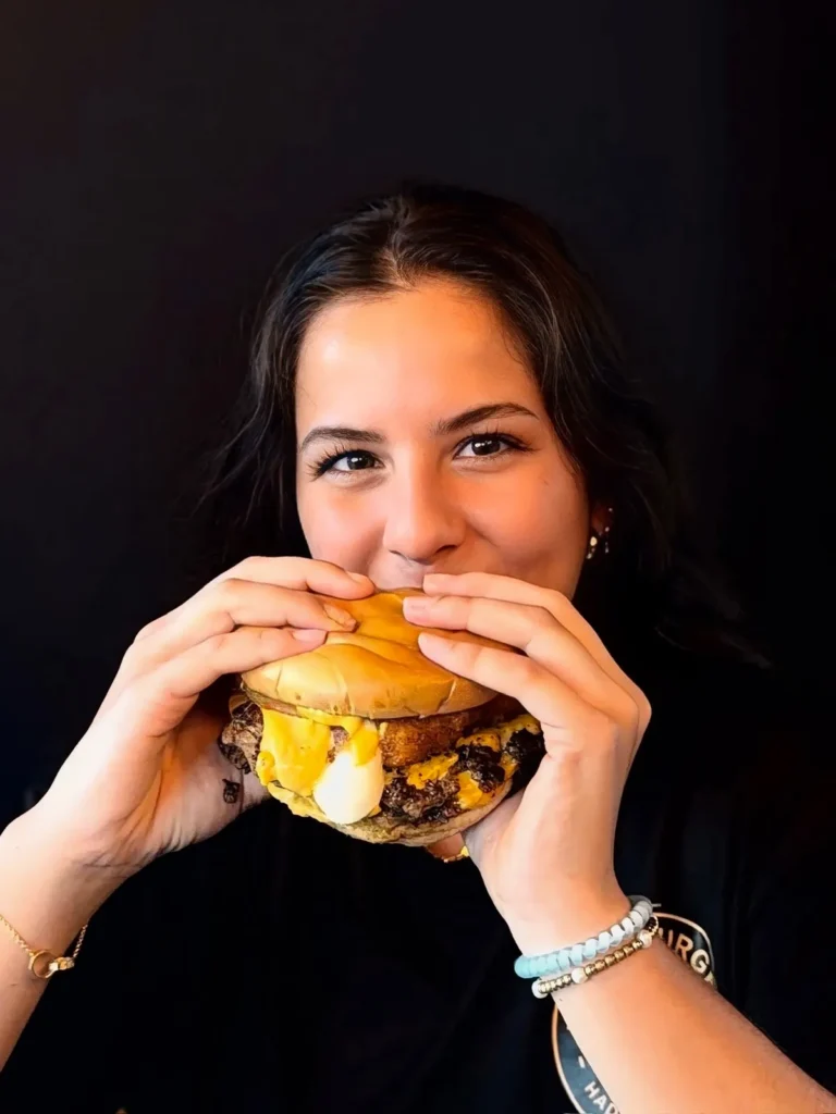 haddaburger customer enjoying halal burger tampa fl